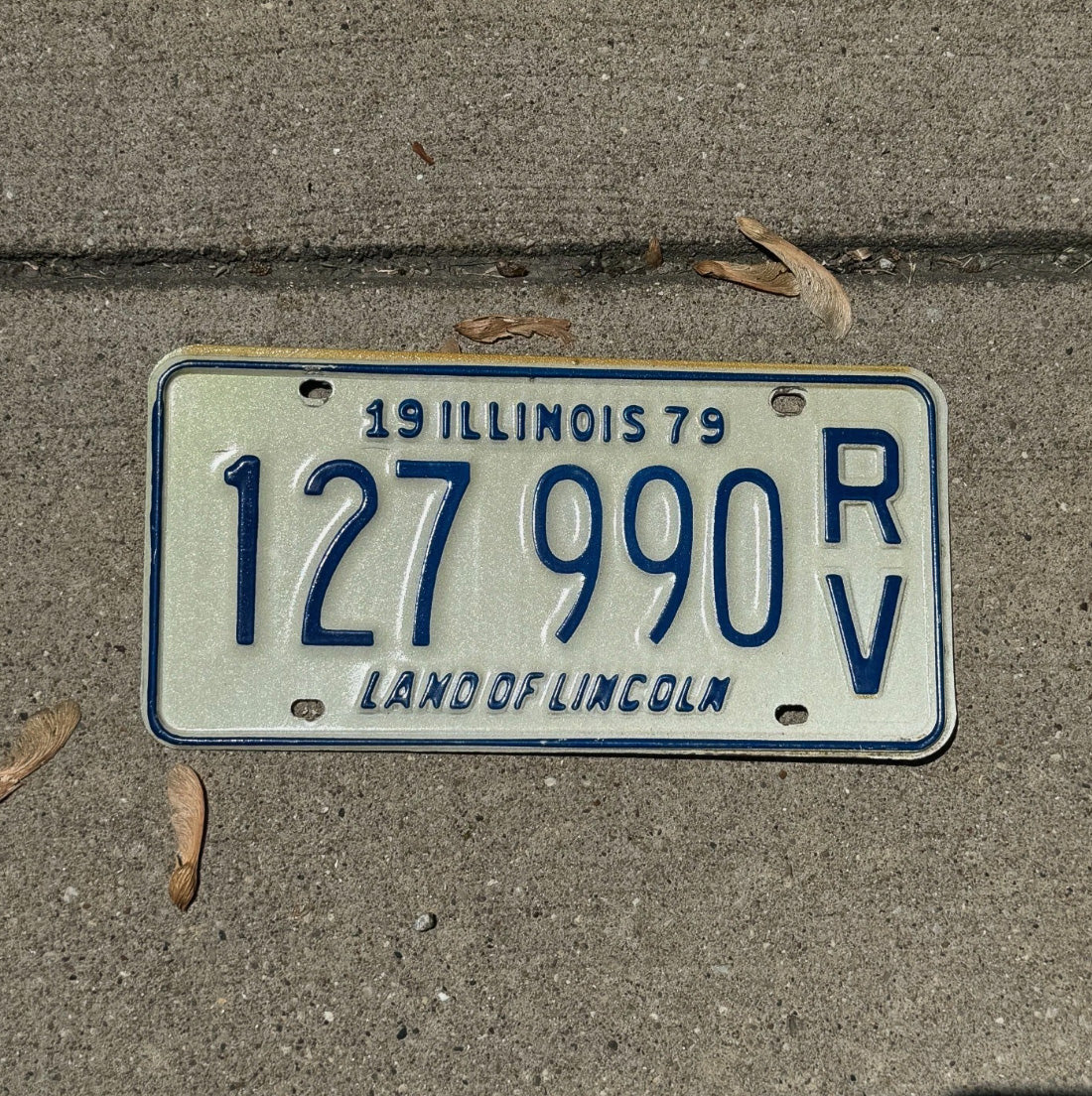 Photo of a 1979 Illinois RV License Plate Auto Tag Garage Decor Rec Vehicle 127 990 RV