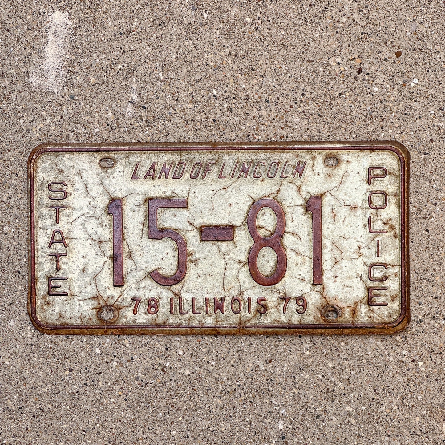 Photo of a 1979 Illinois State Police License Plate Auto Tag Garage Decor Vintage Patrol Cop Trooper 15 81 with original patina