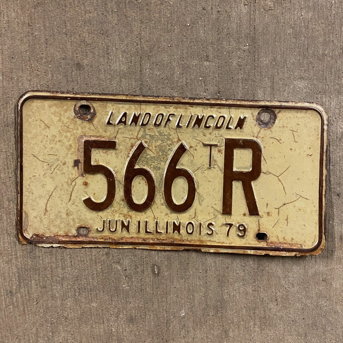 Photo of a 1979 Illinois TRUCK TRACTOR License Plate Auto Tag Garage Decor Vintage License Plate Garage Auto Three Digit Car 566 tR