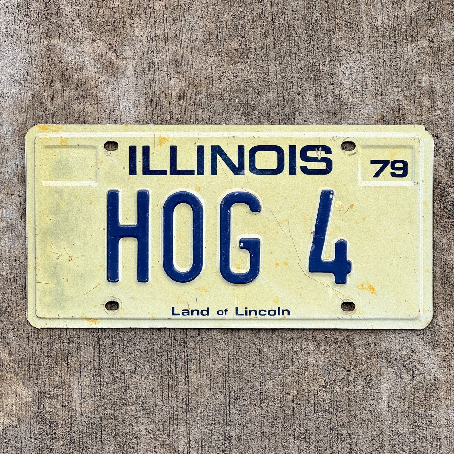 Photo of a 1979 Illinois Vanity License Plate Auto Tag Garage Decor Vintage Harley Motorcycle Enthusiast HOG 4 with original patina
