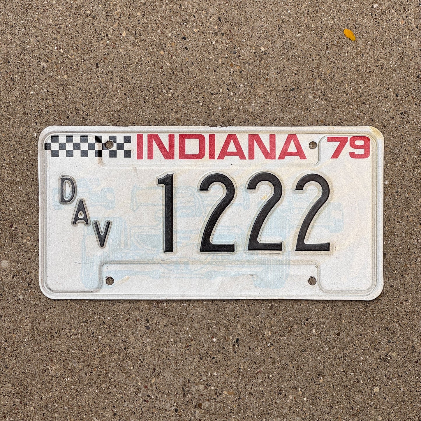 Photo of a 1979 Indiana Disabled Veteran License Plate Auto Tag Garage Decor Vintage DAV Repeat Repeating 1222 with original patina