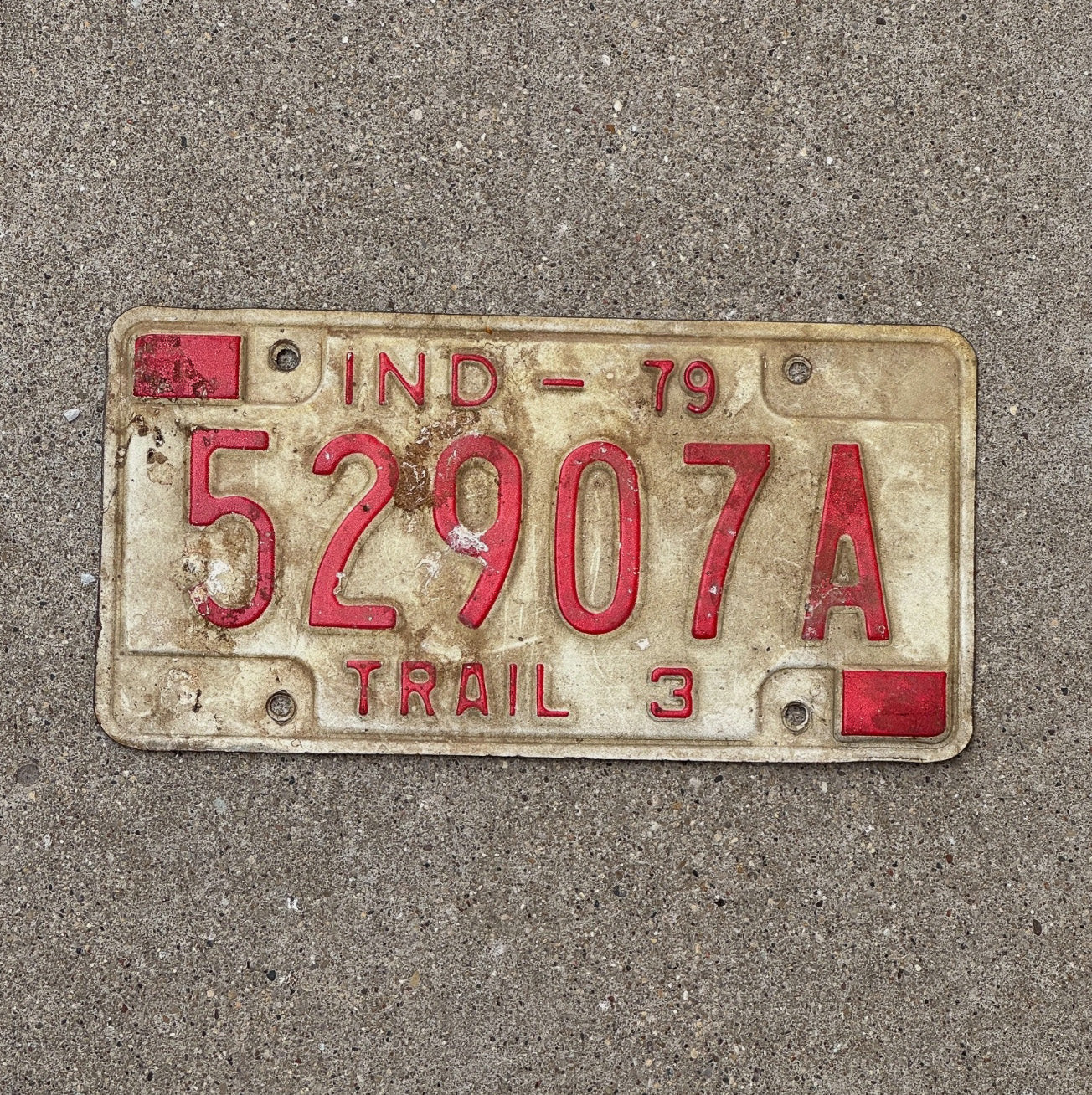 Photo of a 1979 Indiana Trailer License Plate Auto Tag Garage Decor Vintage 52907 A