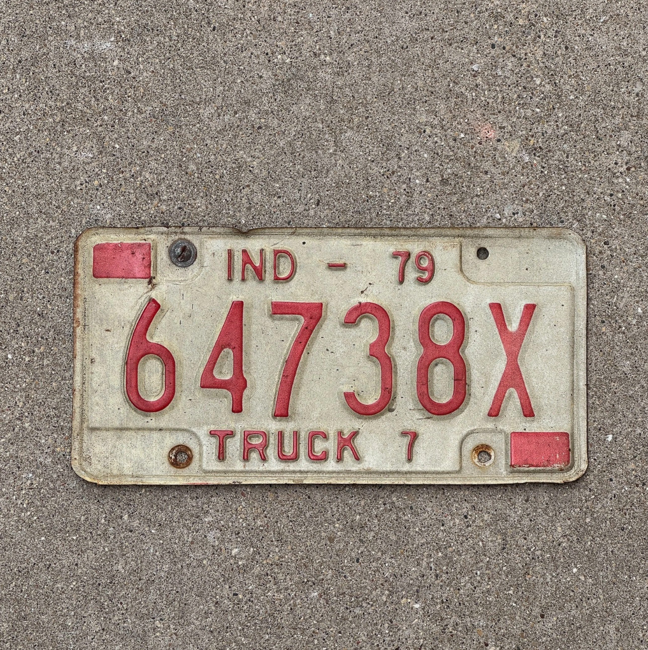 Photo of a 1979 Indiana Truck License Plate Auto Tag Garage Decor Vintage 64738 X