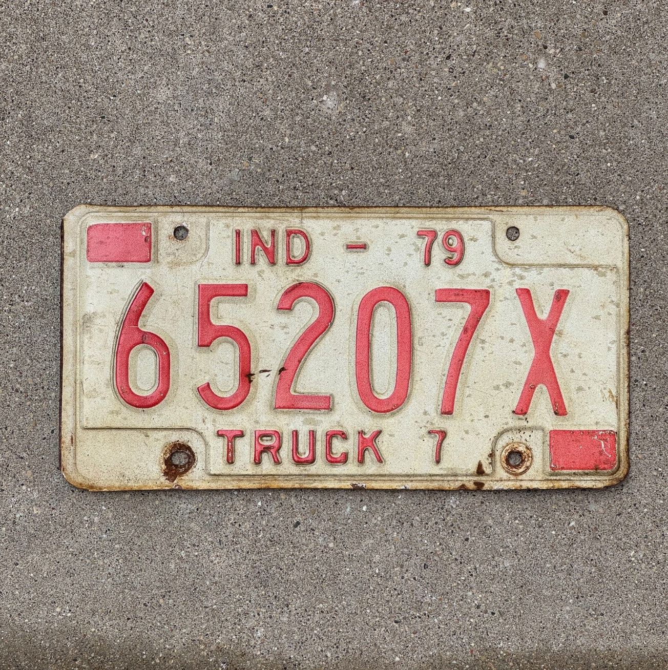 Photo of a 1979 Indiana Truck License Plate Auto Tag Garage Decor Vintage 65207 X