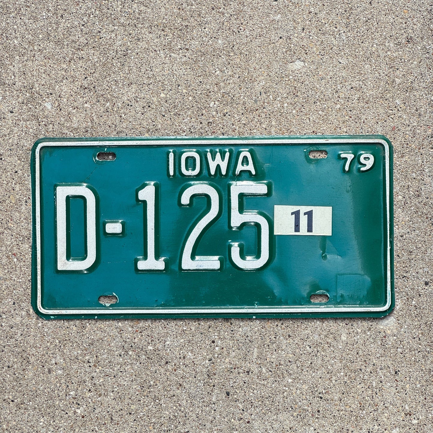 Photo of a 1979 Iowa Dealer License Plate Auto Tag Garage Decor Vintage D 125