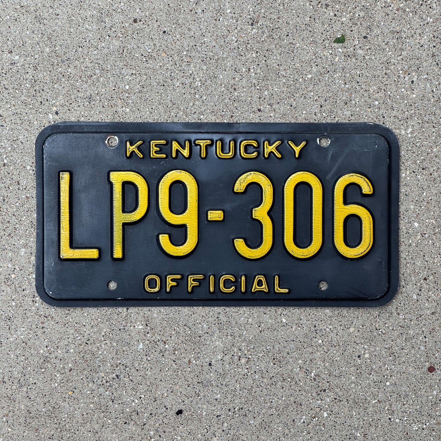 Photo of a 1979 Kentucky Official License Plate Auto Tag Garage Decor Vintage Black LP 9306