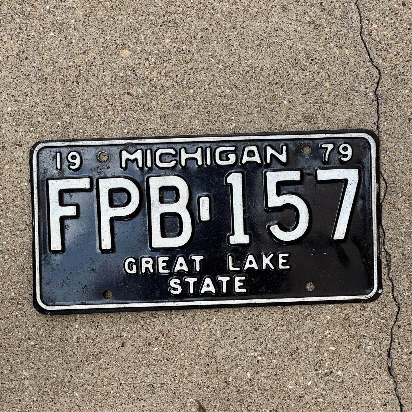 Photo of a 1979 Michigan License Plate Auto Tag Garage Decor Vintage FPB 157
