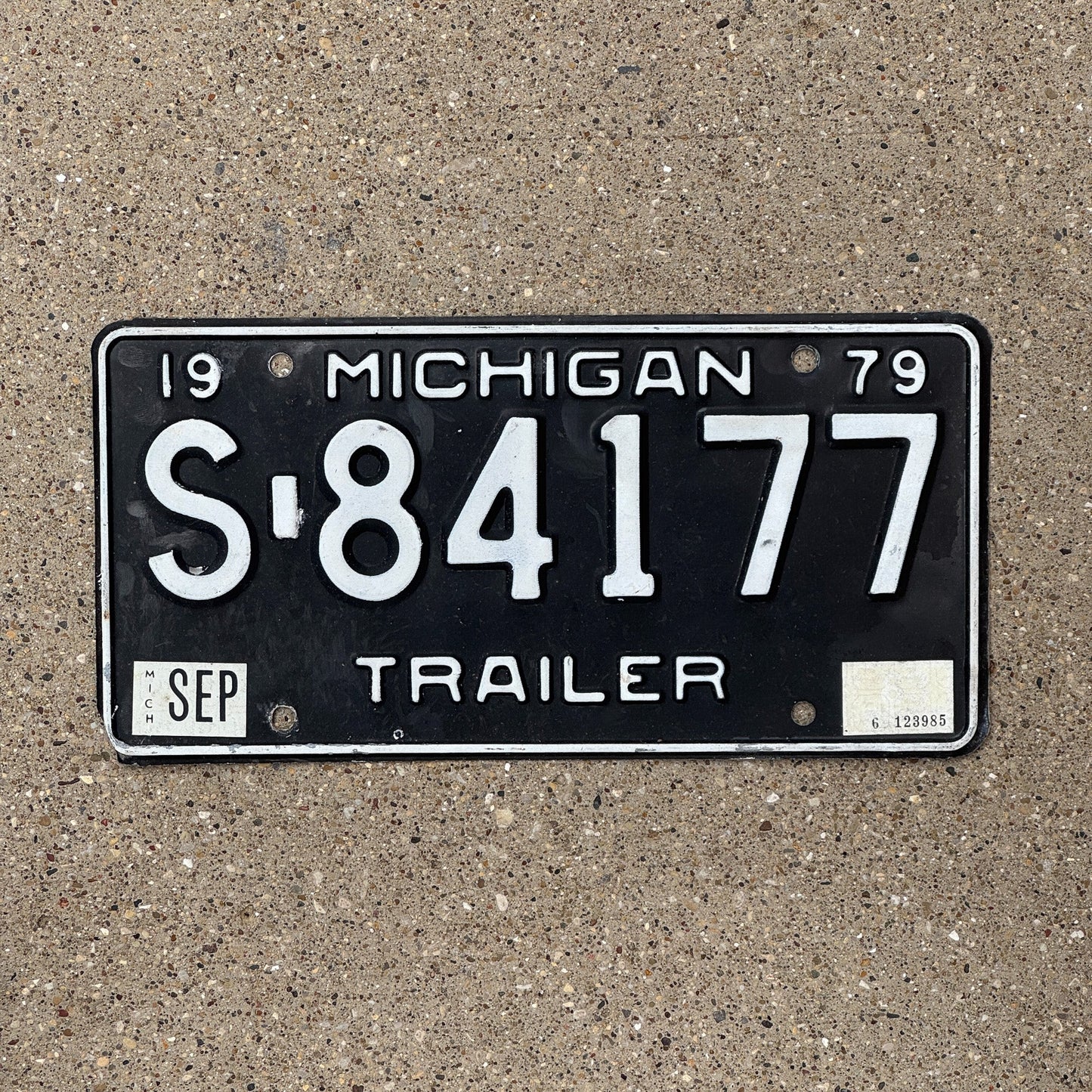 Photo of a 1979 Michigan Trailer License Plate Auto Tag Garage Decor Vintage S 84177