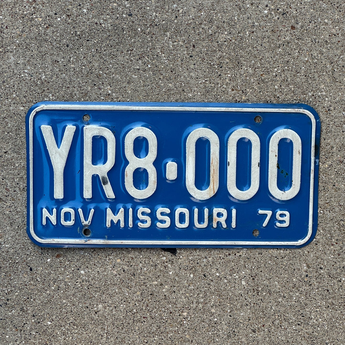 Photo of a 1979 Missouri License Plate Auto Tag Garage Decor Vintage Fun Number YR 8000