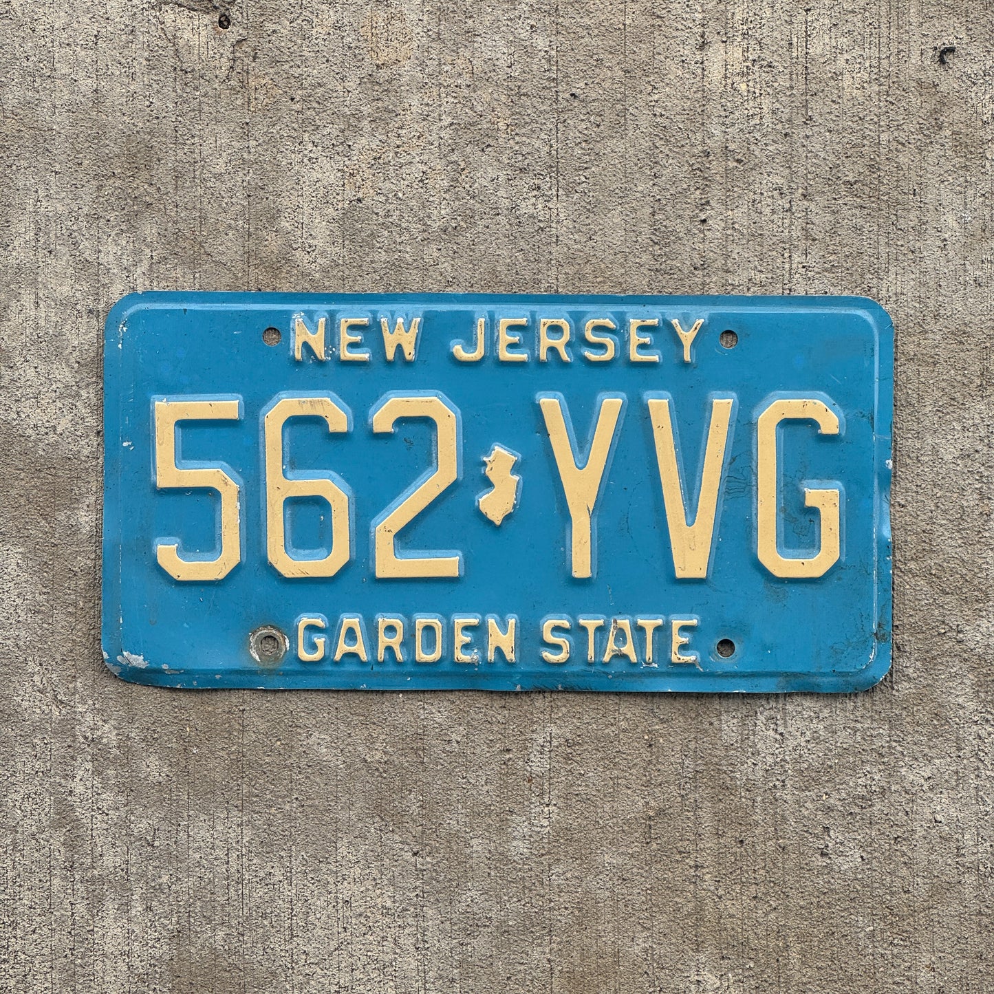 Photo of a 1979 New Jersey License Plate Auto Tag 1 Vintage Garage Blue 562 YVG with original patina