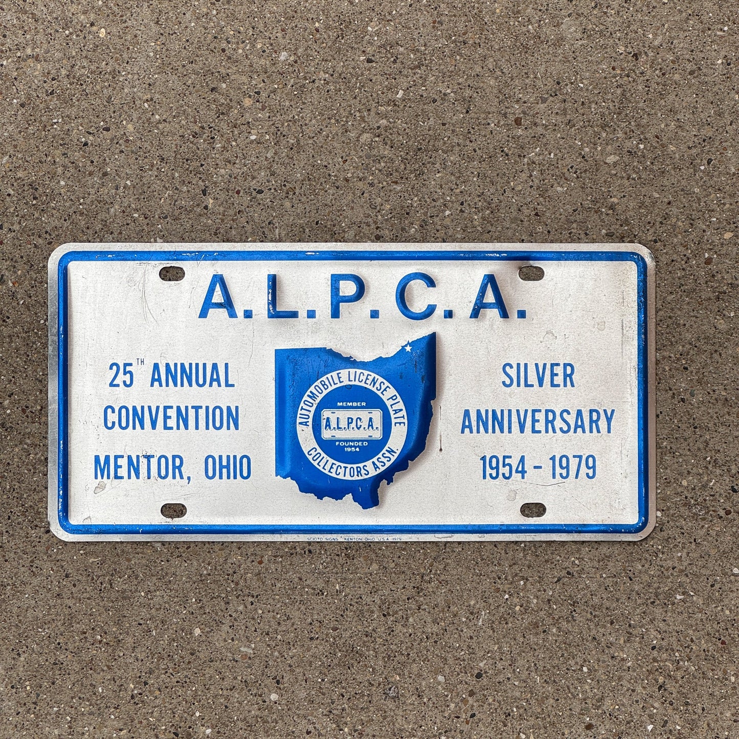 Photo of a 1979 Ohio Booster License Plate Auto Tag Garage Decor Vintage Mentor OH ALPCA Convention