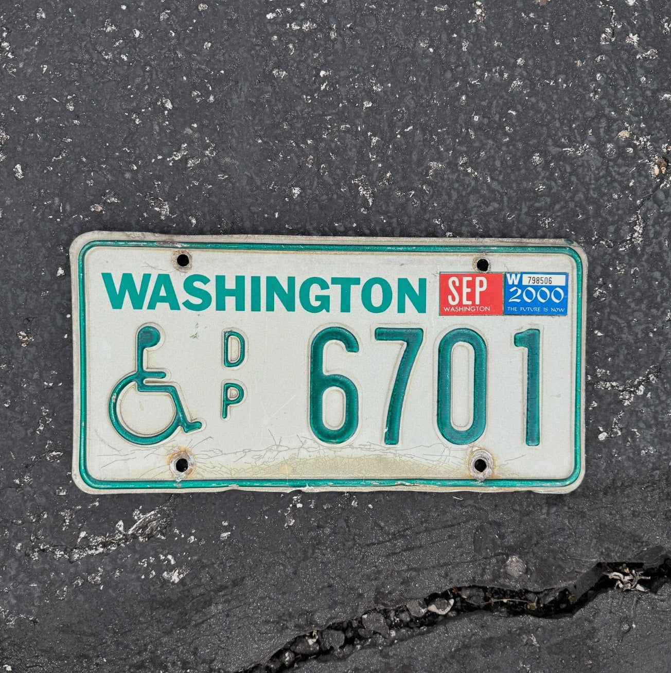 Photo of a 1979 Washington Handicapped License Plate Auto Tag Garage Decor Vintage Disabled DP 6701