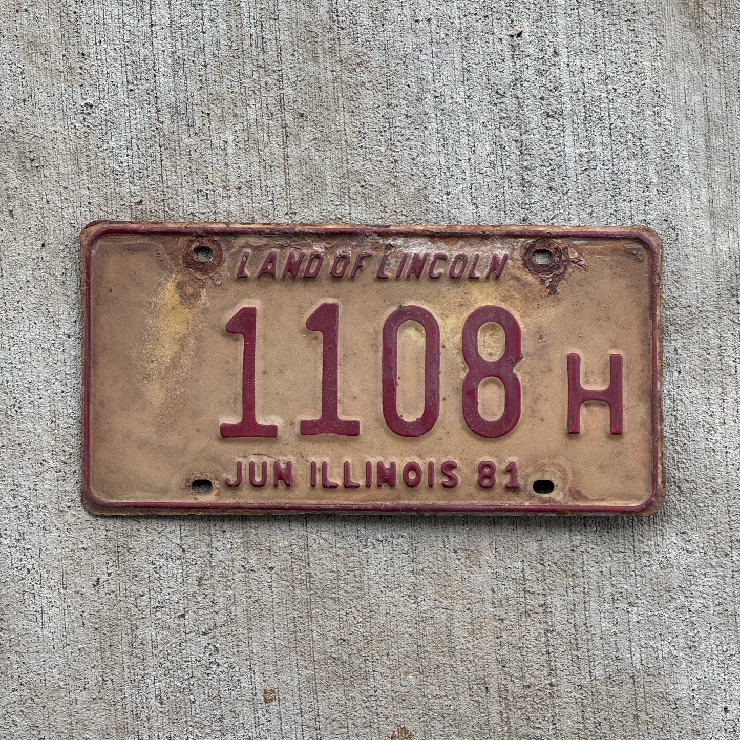 Photo of a 1980 1981 Illinois Truck License Plate Auto Tag 2 Vintage Garage 1108 H with original patina