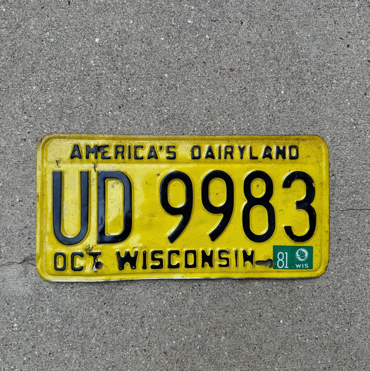 Photo of a 1980 1981 Wisconsin License Plate Auto Tag Garage Decor Vintage Dairyland UD 9983