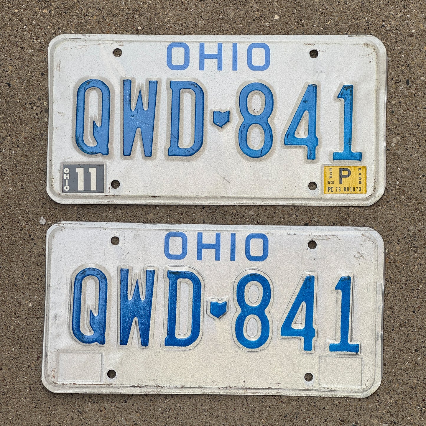 Photo of a 1980 1983 Ohio License Plate Pair Auto Tag Garage Decor Vintage QWD 841 with original patina