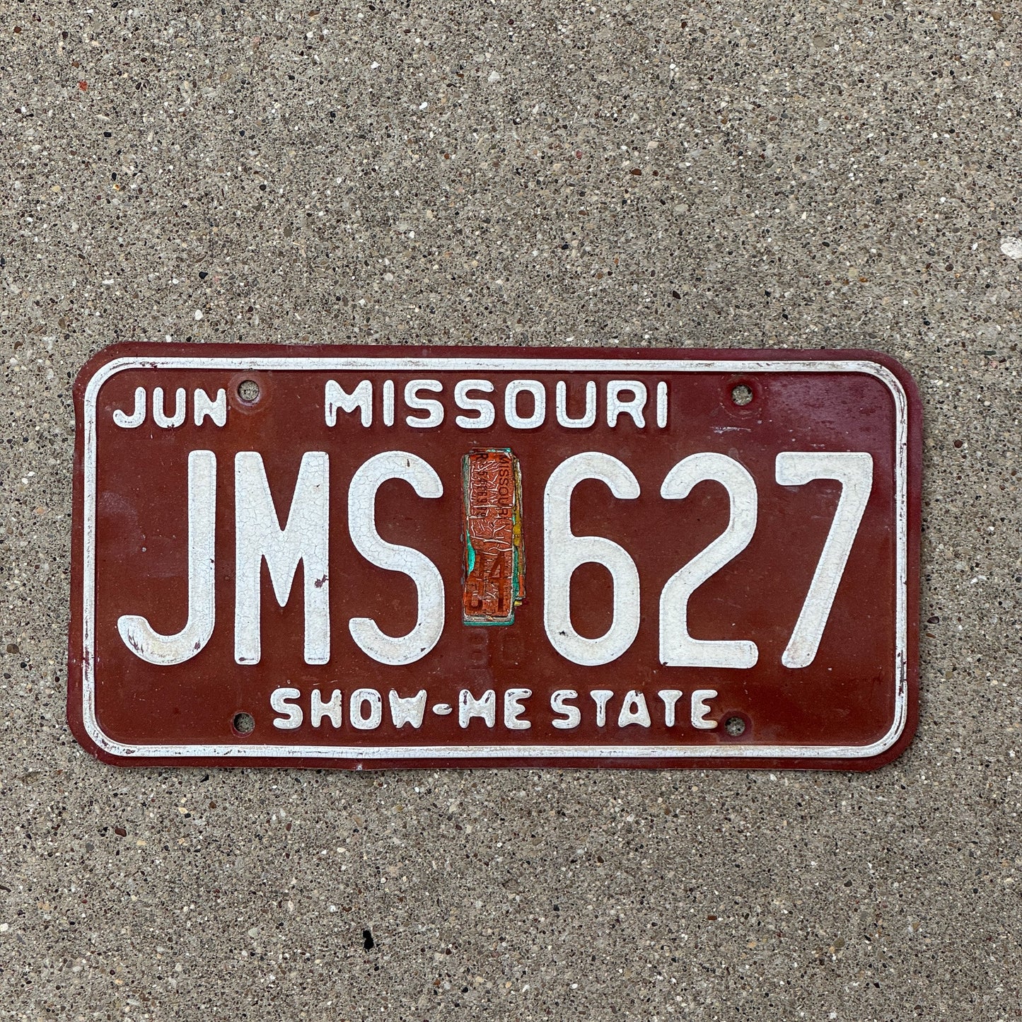 Photo of a 1980 1984 Missouri License Plate Auto Tag Garage Decor Vintage JMS 627