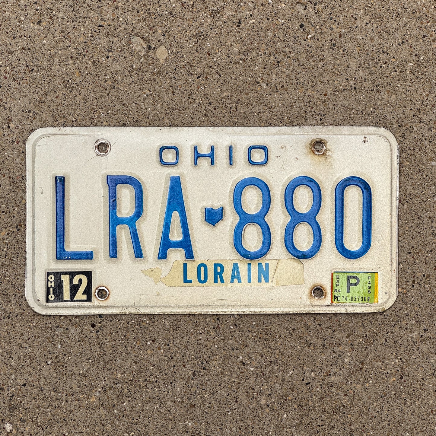 Photo of a 1980 1984 Ohio License Plate Auto Tag Garage Decor Vintage LRA 880 with original patina