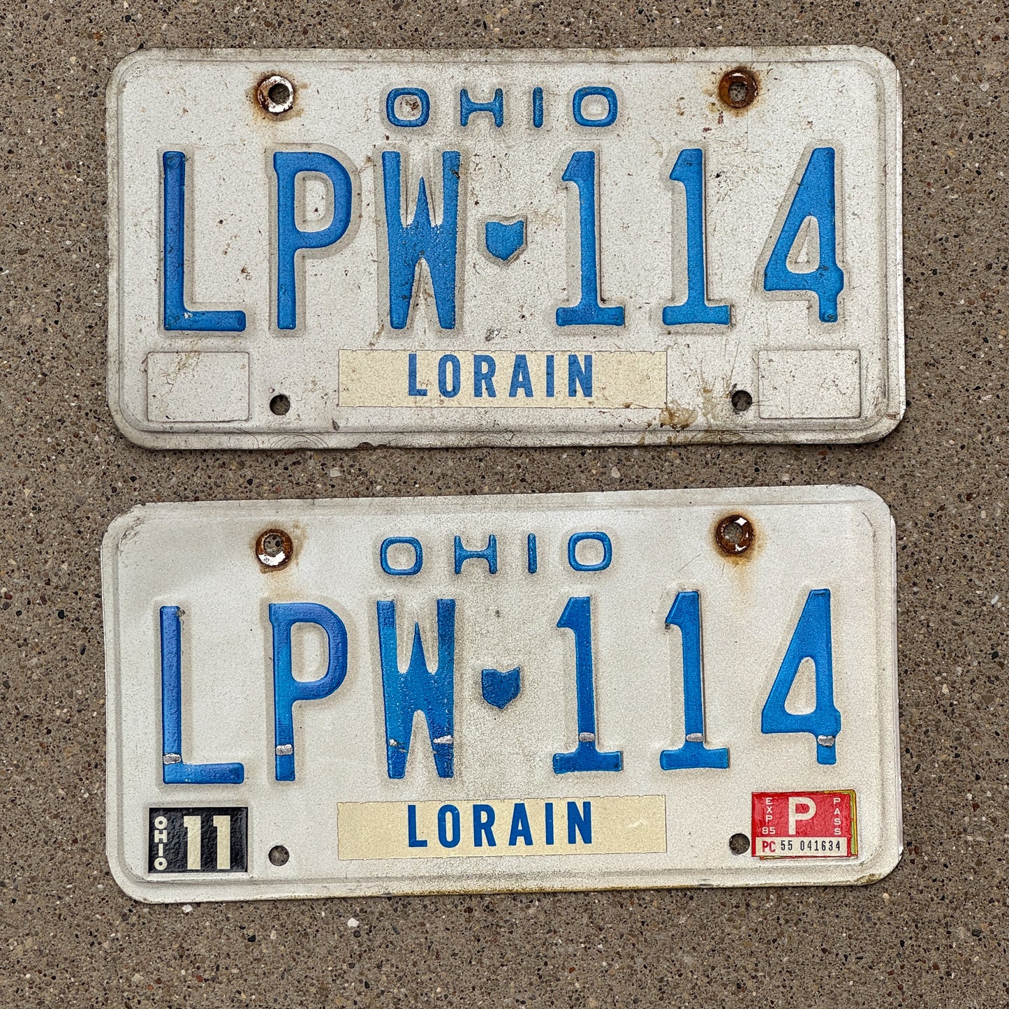 Photo of a 1980 1985 Ohio License Plate Pair Auto Tag Garage Decor Vintage LPW 114 with original patina