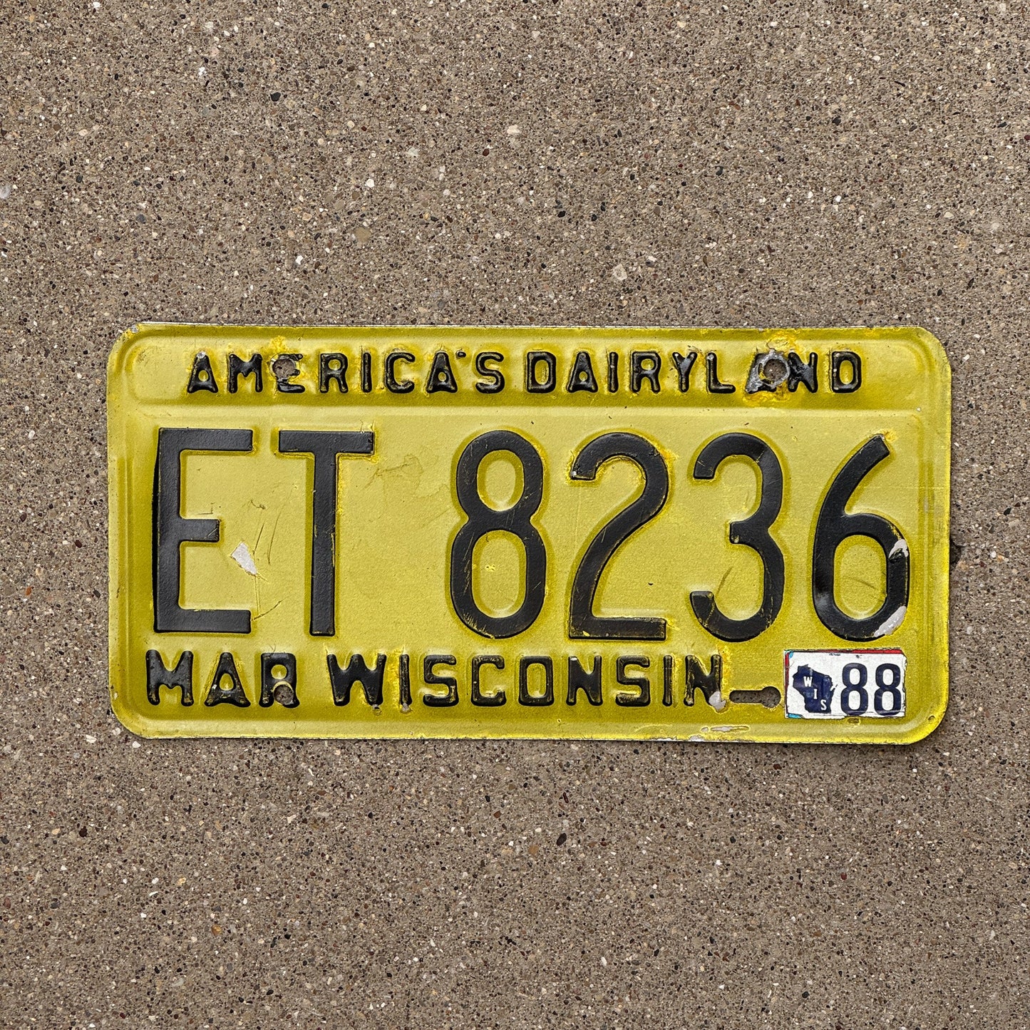 Photo of a 1980 1988 Wisconsin License Plate Auto Tag Garage Decor Vintage ET 8236