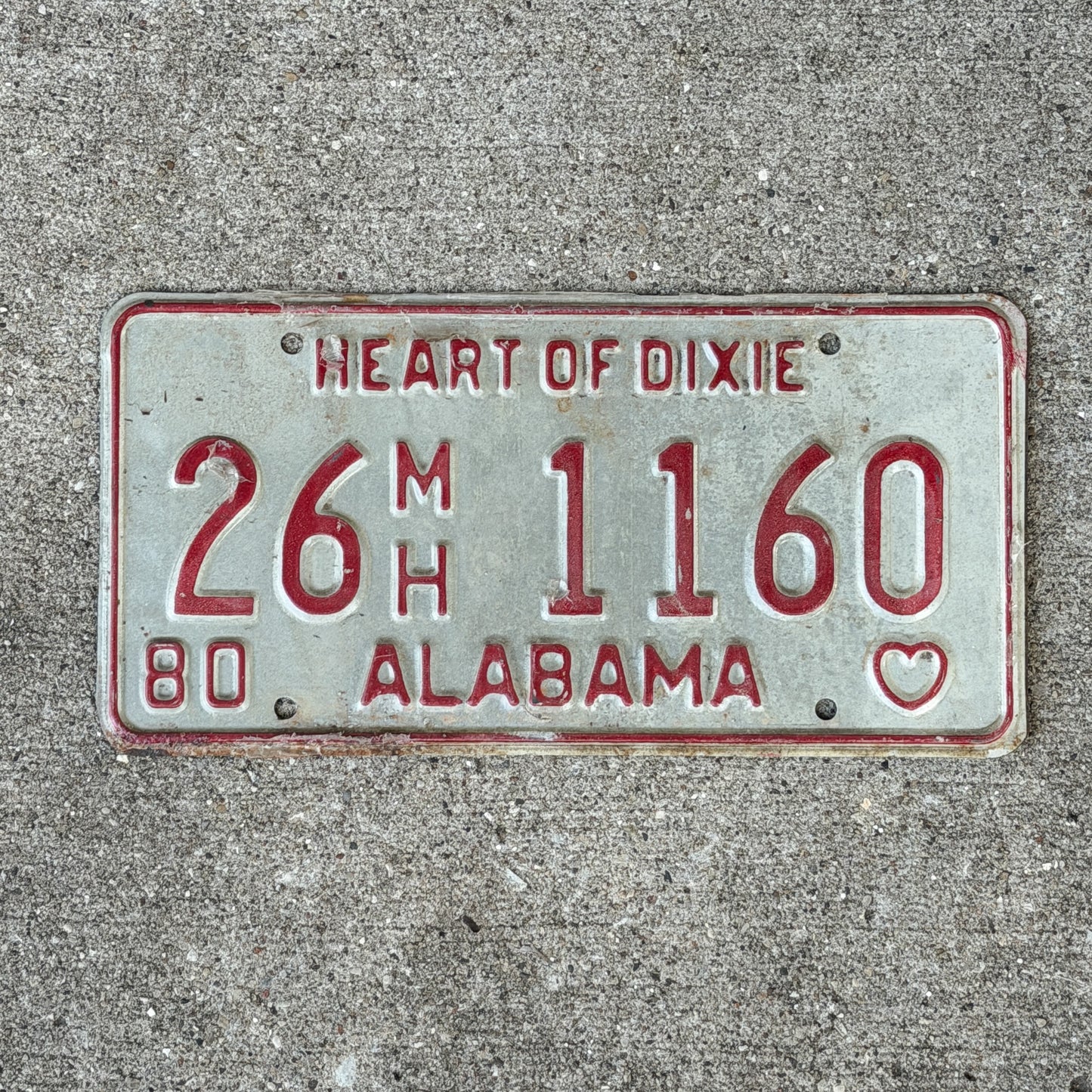 Photo of a 1980 Alabama Mobile Home License Plate Auto Tag Garage Decor Vintage 26 MH 1160 with original patina
