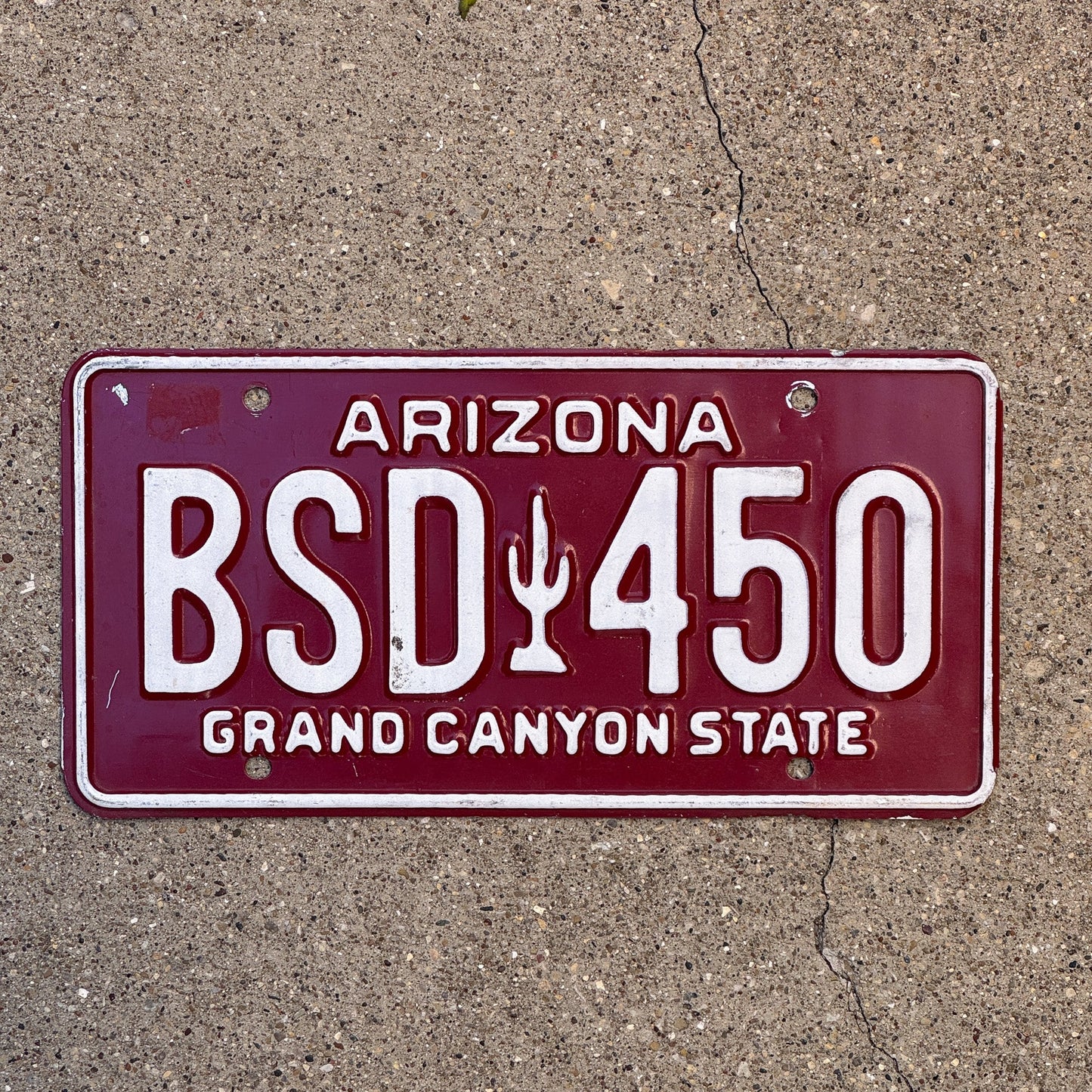 Photo of a 1980 Arizona License Plate Auto Tag Garage Decor Vintage Cactus BSD 450 with original patina