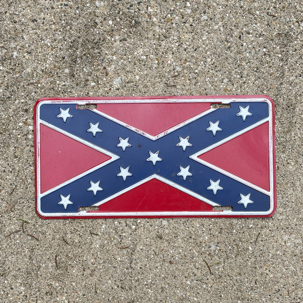 Photo of a 1980 Era Booster License Plate Auto Tag Garage Decor Vintage Confederate Flag Metal with original patina
