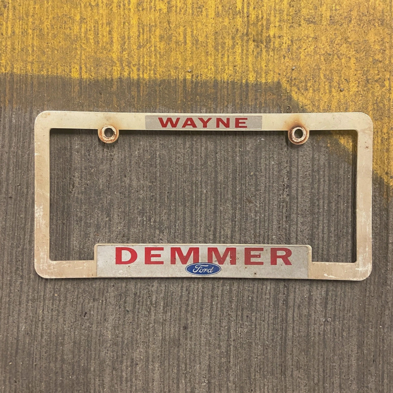 Photo of a 1980 Era Michigan License Plate Frame Auto Tag Garage Decor Vintage Wayne Plastic Ford Demmer