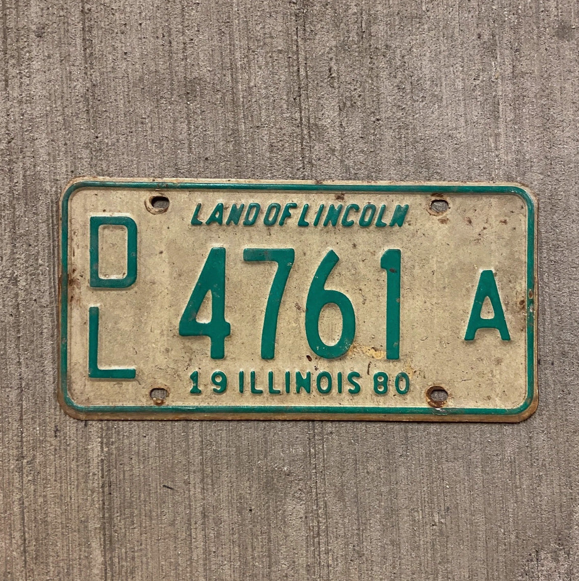 Photo of a 1980 Illinois Dealer License Plate Auto Tag Garage Decor Vintage 4761 A
