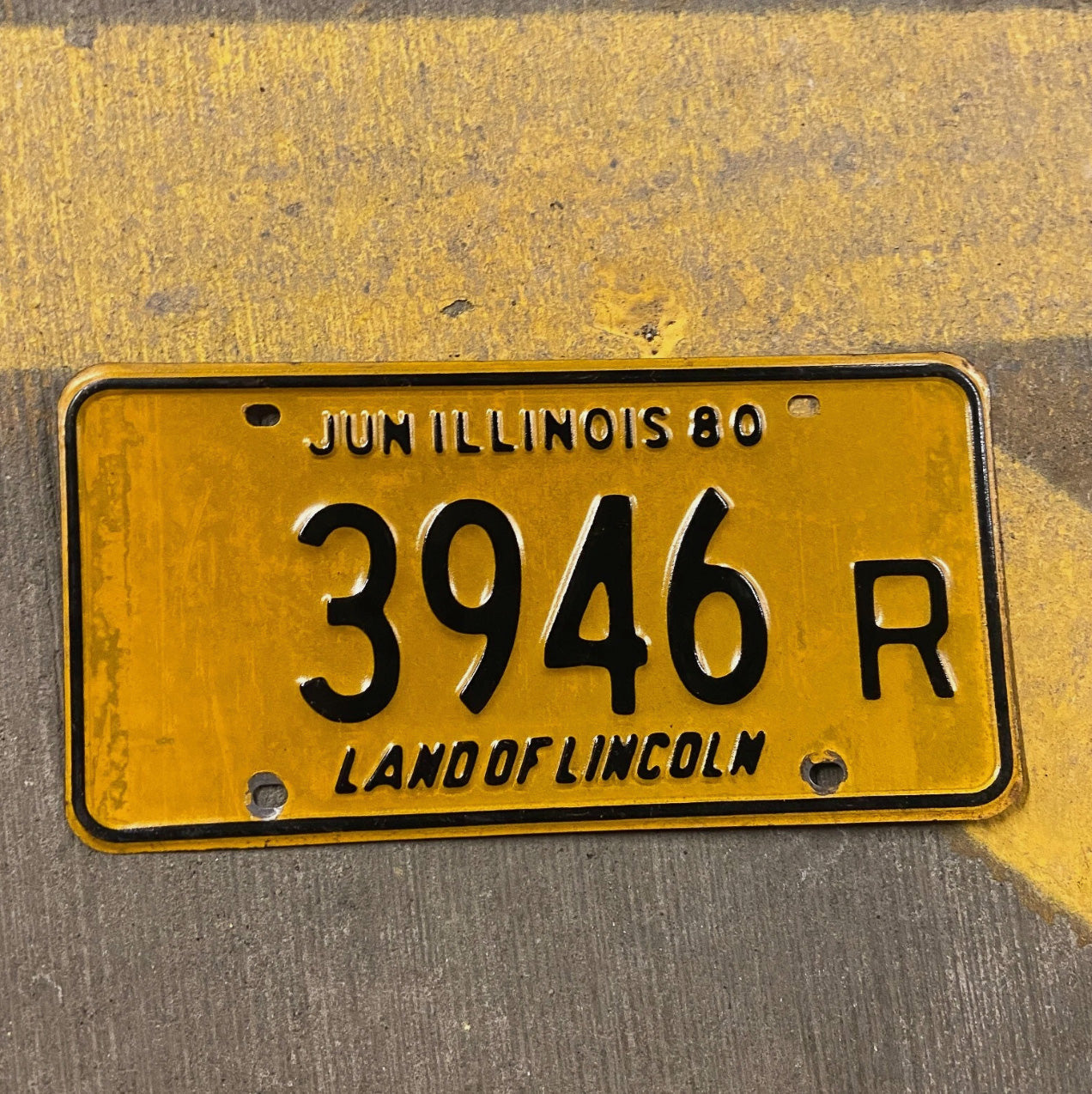 Photo of a 1980 Illinois Truck License Plate Auto Tag Garage Decor Vintage 3946 R with original patina