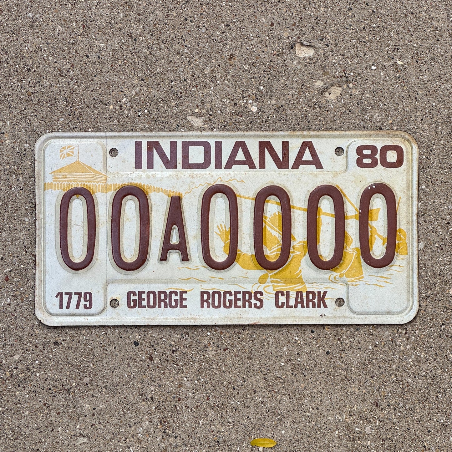 Photo of a 1980 Indiana Sample License Plate Auto Tag 3 Vintage 00A0000 with original patina