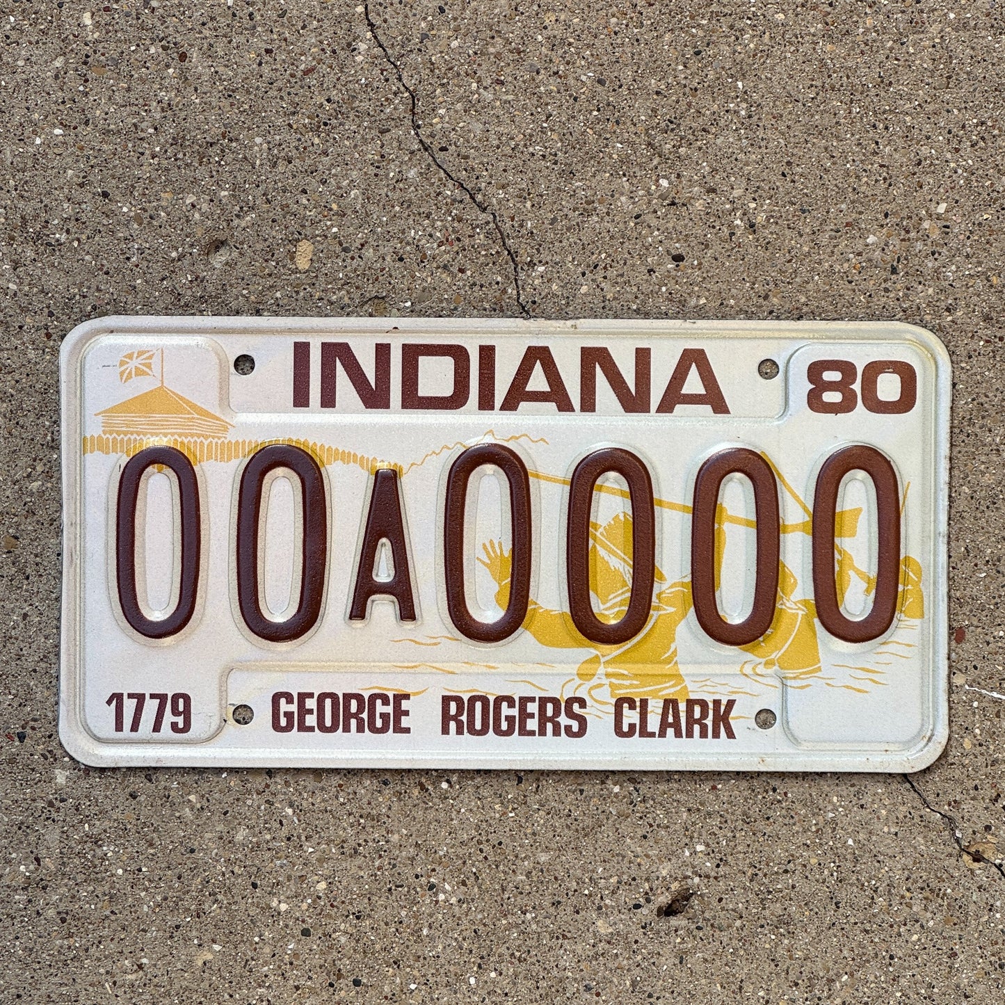 Photo of a 1980 Indiana Sample License Plate Auto Tag 6 Vintage 00A0000 with original patina