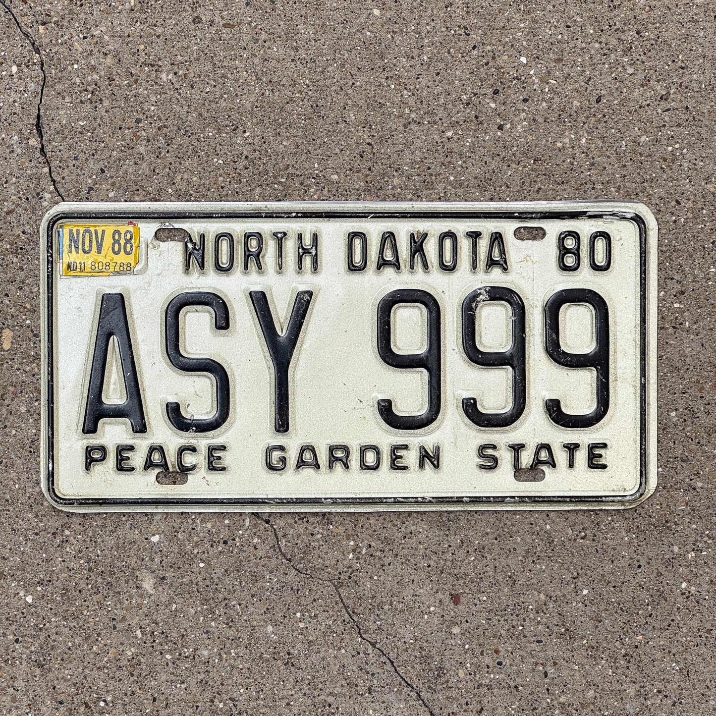 Photo of a 1980 North Dakota License Plate Auto Tag Garage Decor Vintage Repeat Repeating ASY 999