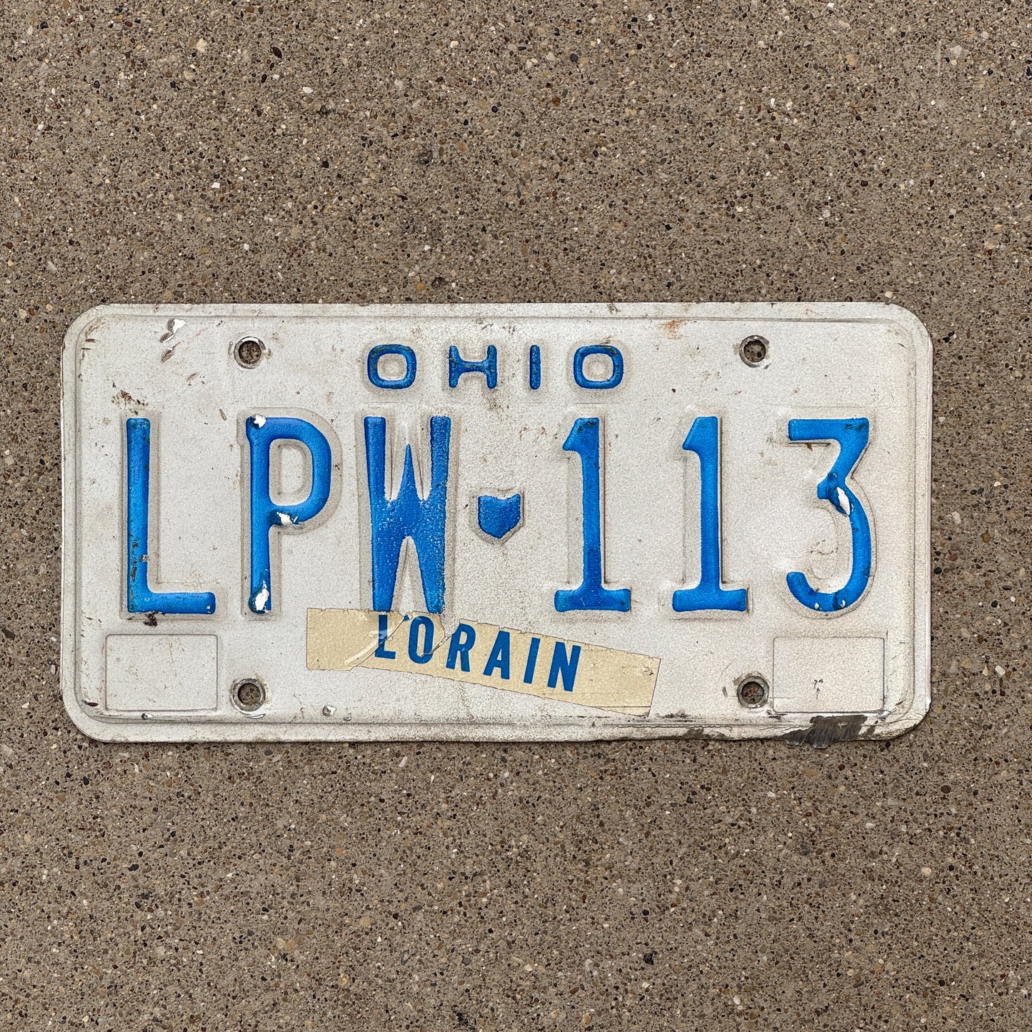 Photo of a 1980 Ohio License Plate Auto Tag 2 Vintage Garage LPW 113 with original patina