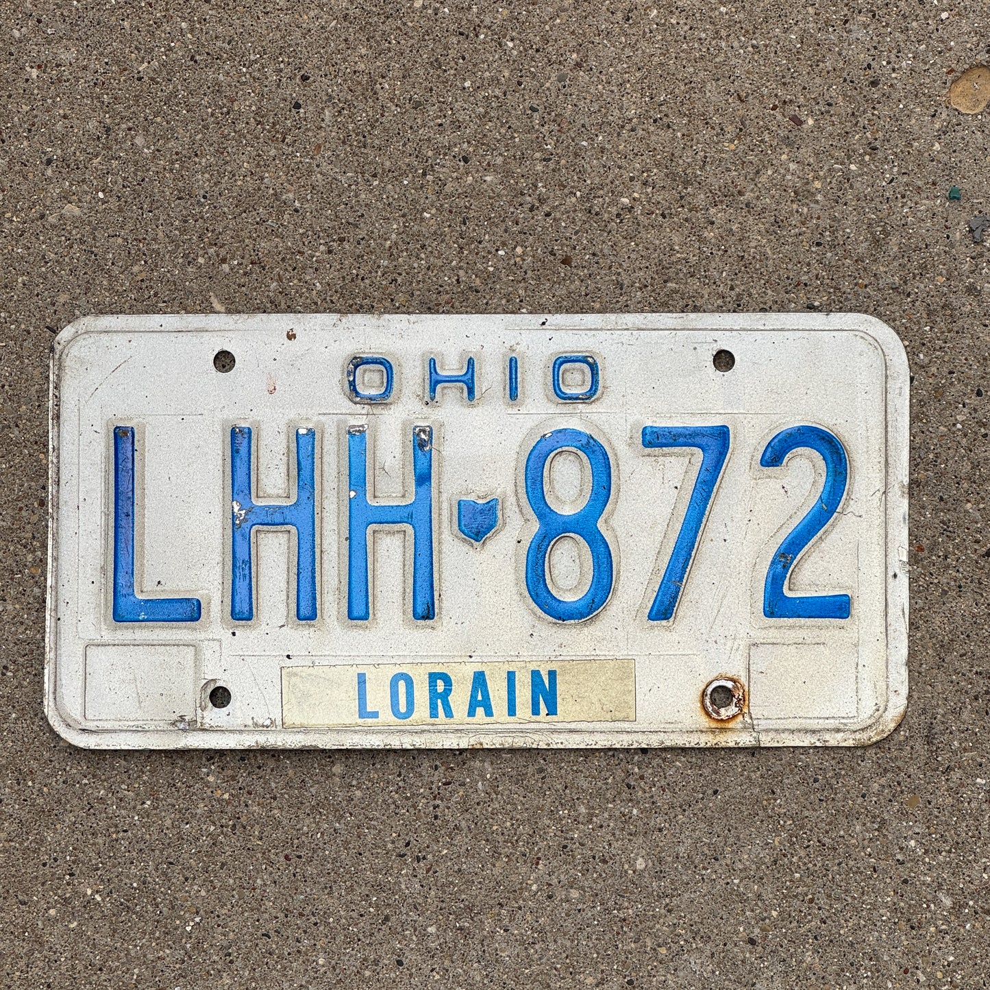 Photo of a 1980 Ohio License Plate Auto Tag Garage Decor Vintage LHH 872 with original patina