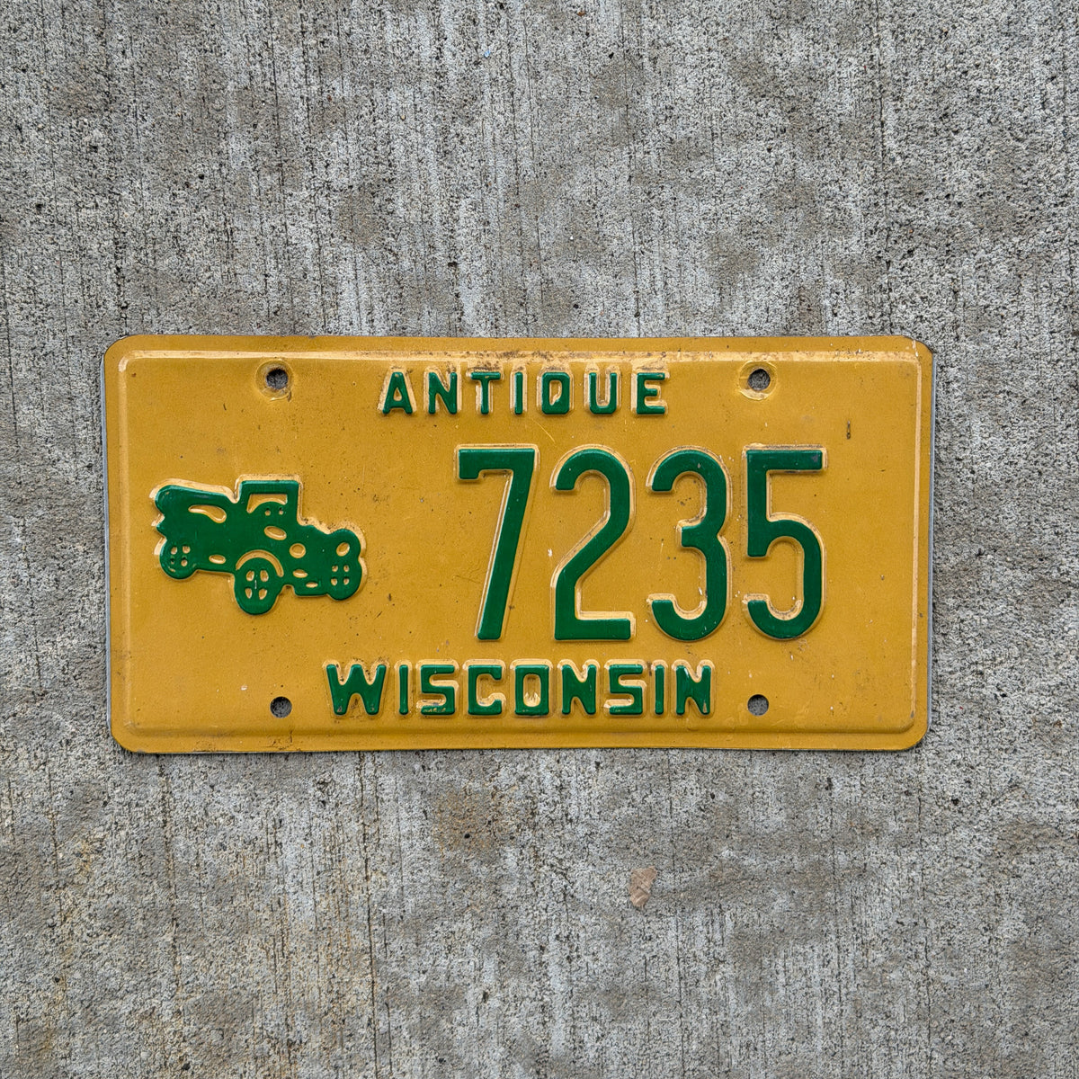 Photo of a 1980 Wisconsin Antique Vehicle License Plate Auto Tag 2 Vintage Garage 7235 with original patina