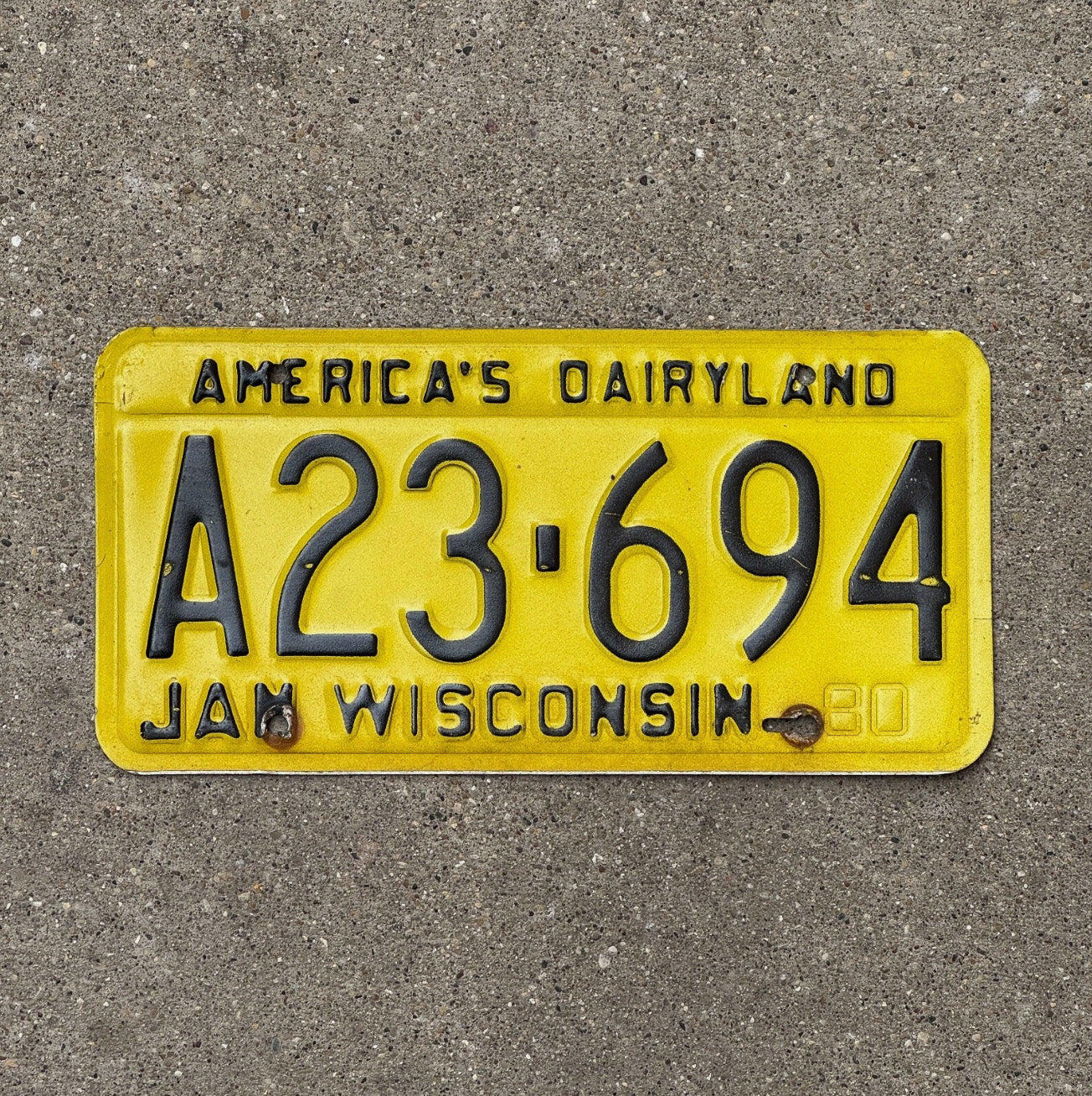 Photo of a 1980 Wisconsin License Plate Auto Tag Garage Decor Dairyland Dairyland A 23694