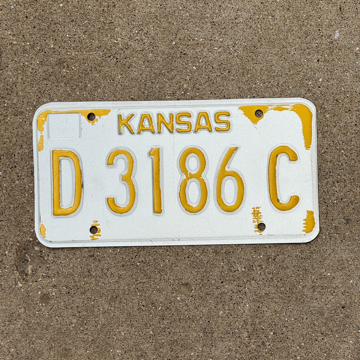Photo of a 1980s 1990s Kansas Dealer Error License Plate Auto Tag Garage Decor Vintage Misprint D 3186 C