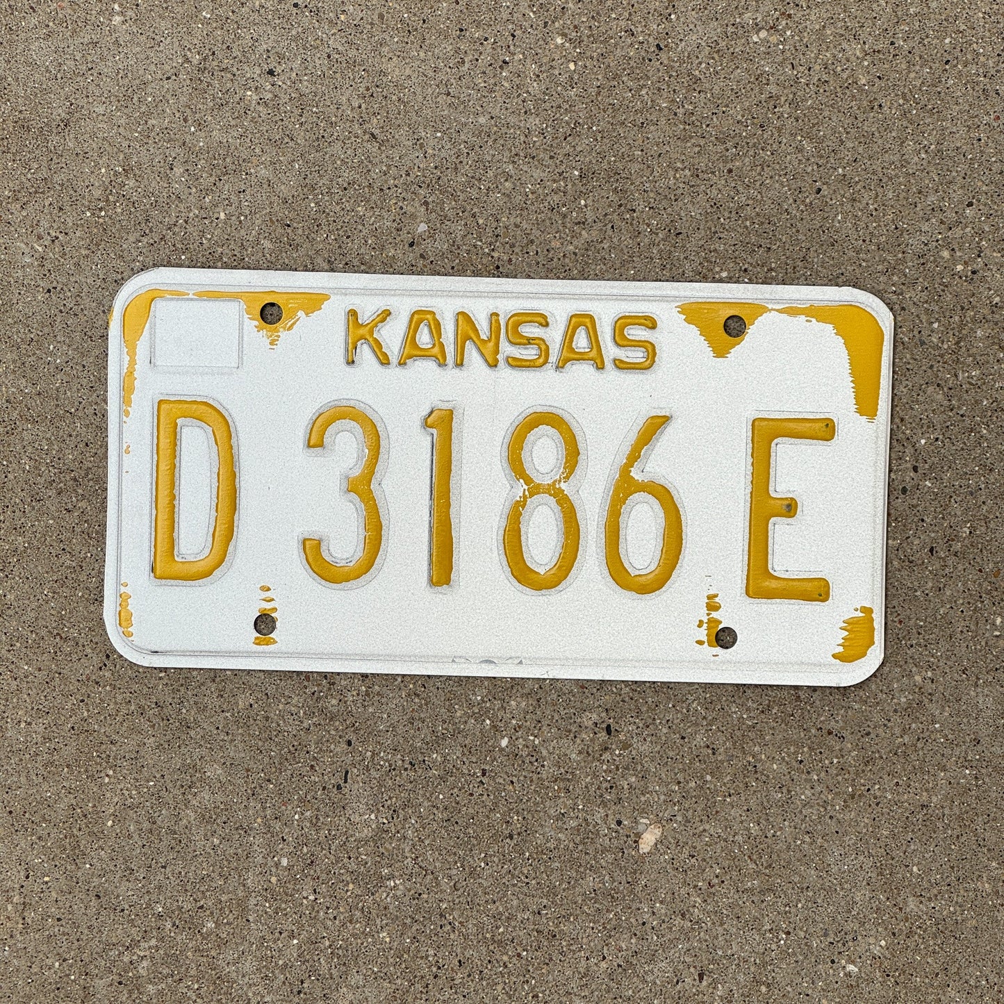 Photo of a 1980s 1990s Kansas Dealer Error License Plate Auto Tag Garage Decor Vintage Misprint D 3186 E
