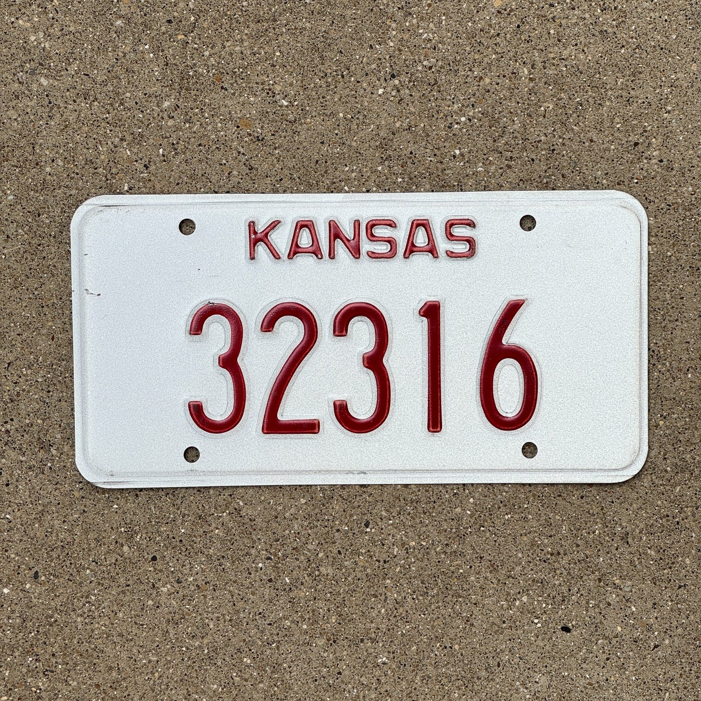 Photo of a 1980s 1990s Kansas Error / Prototype License Plate Auto Tag Garage Decor Vintage 32316