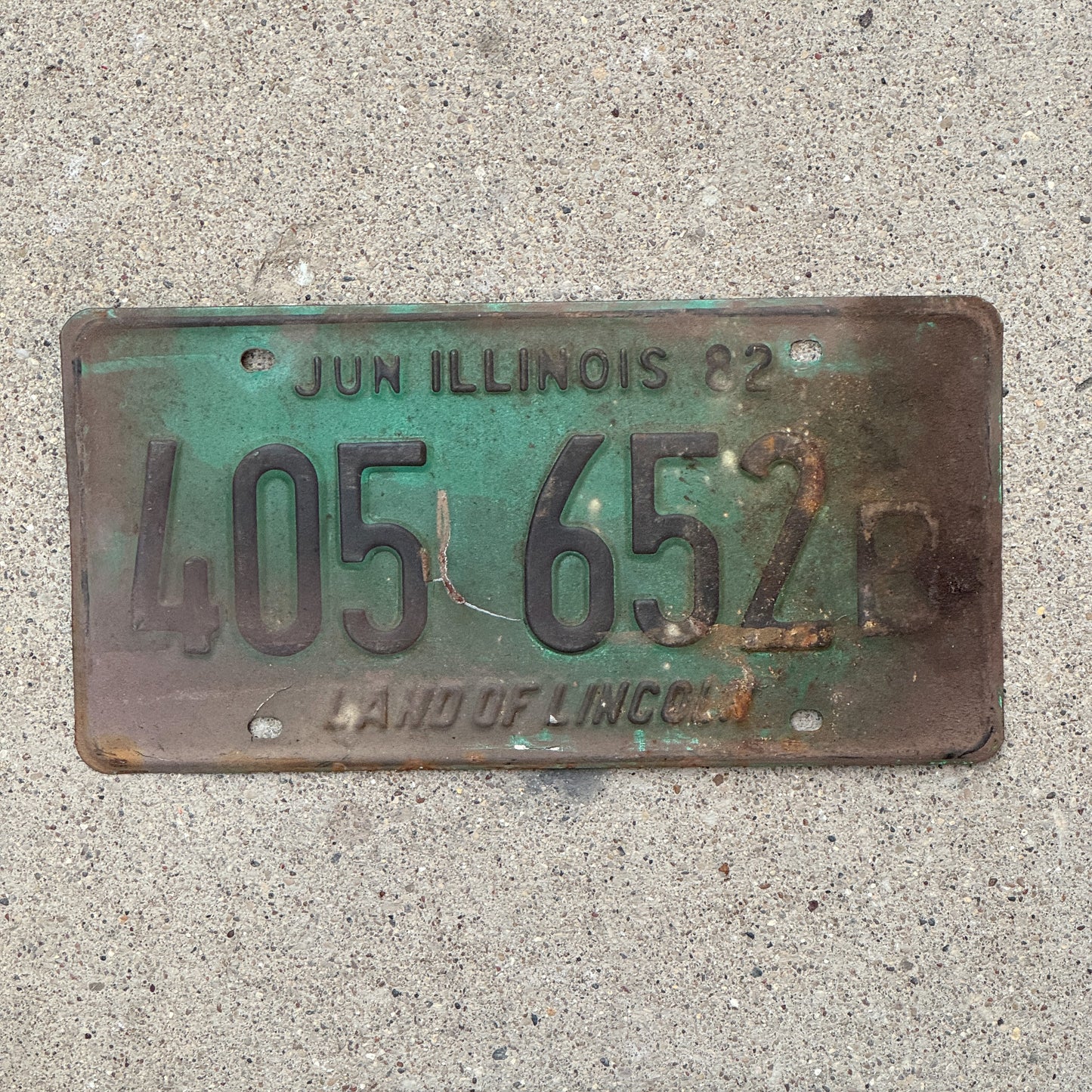 Photo of a 1981 1982 Illinois Truck License Plate Auto Tag Garage Decor Vintage 405 652 B with original patina