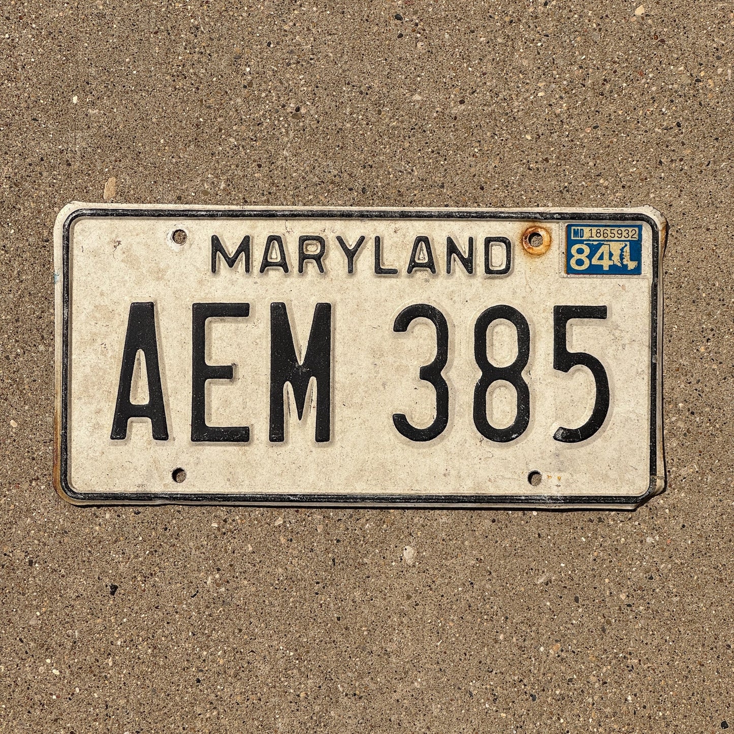 Photo of a 1981 1984 Maryland License Plate Auto Tag Garage Decor Vintage AEM 385