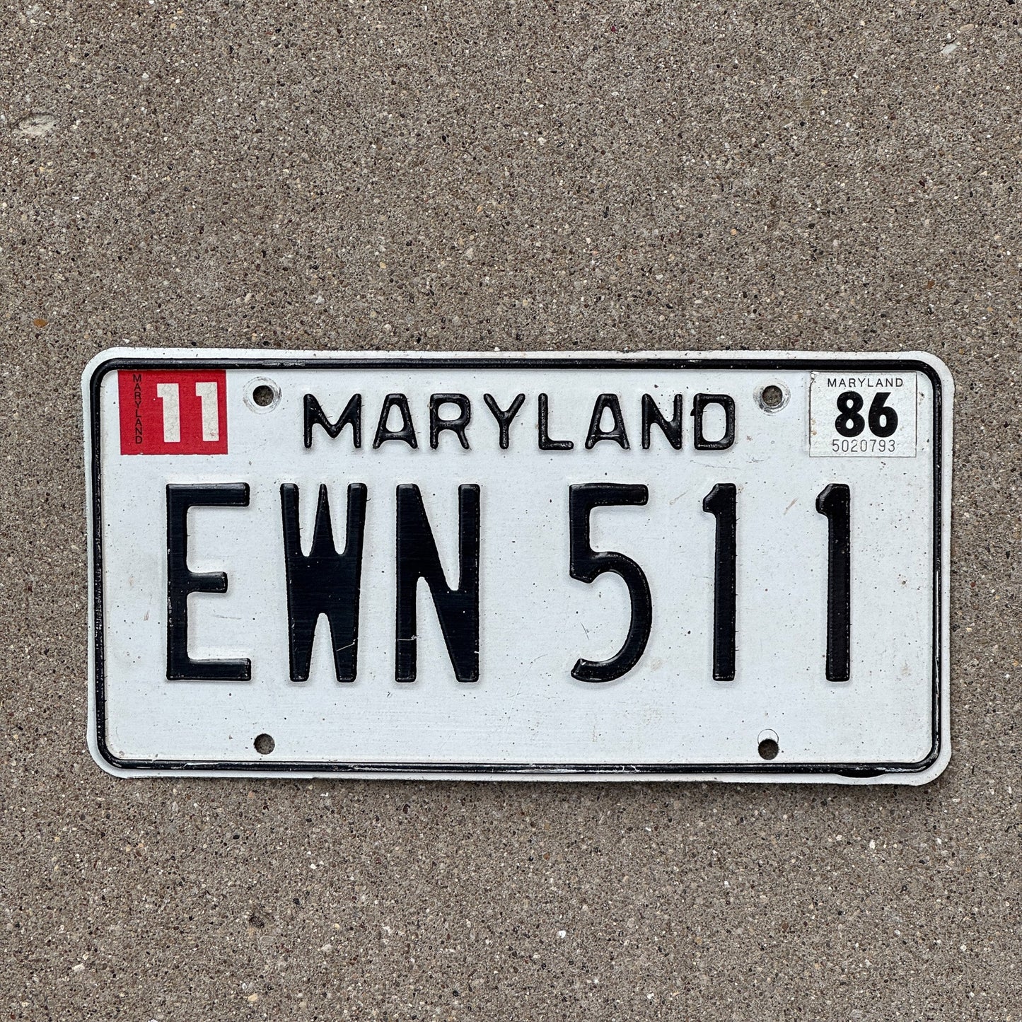 Photo of a 1981 1986 Maryland License Plate Auto Tag Garage Decor Vintage Black White EWN 511