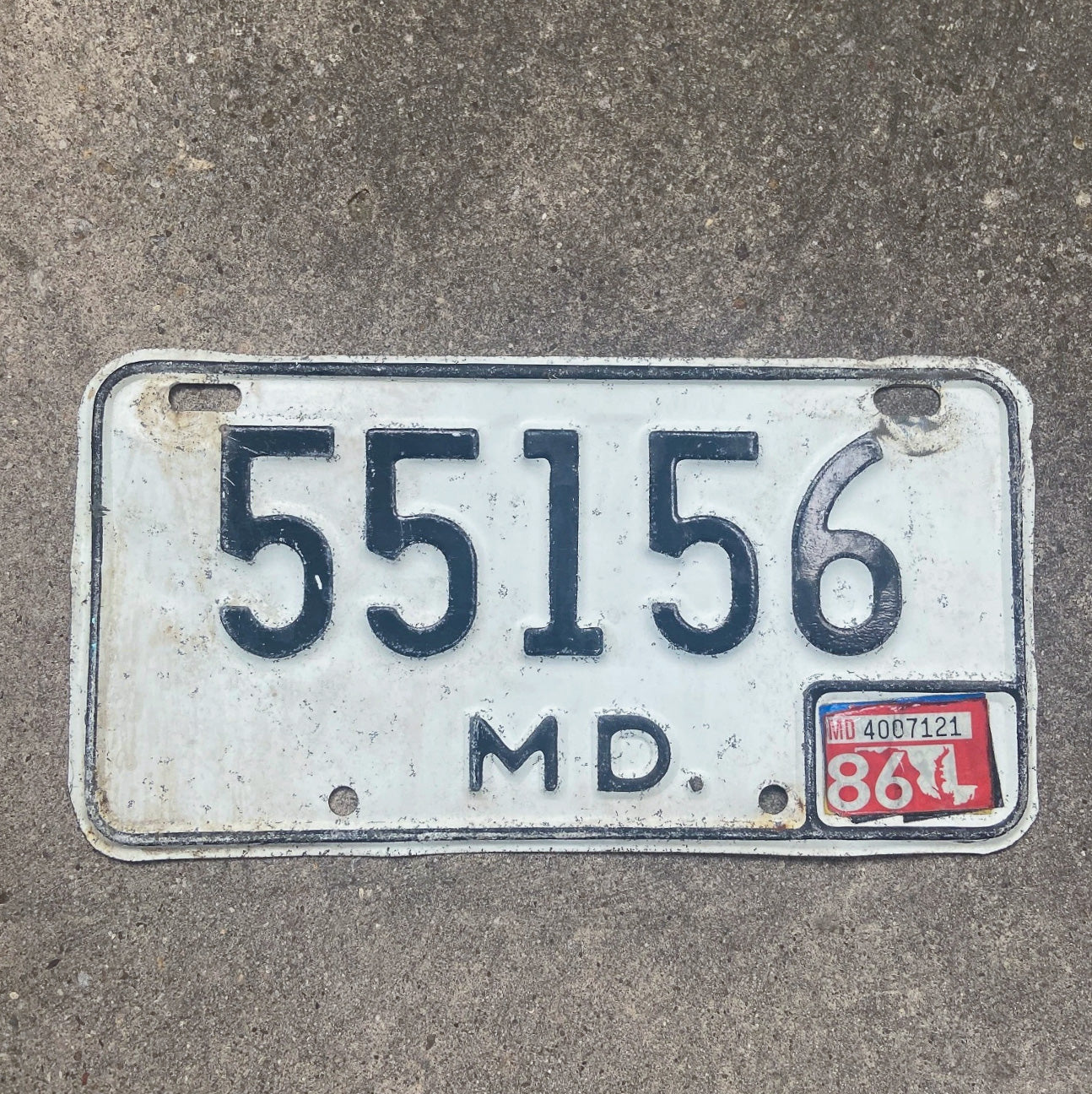 Photo of a 1981 1986 Maryland Motorcycle License Plate Auto Tag Garage Decor Vintage 55156 with original patina