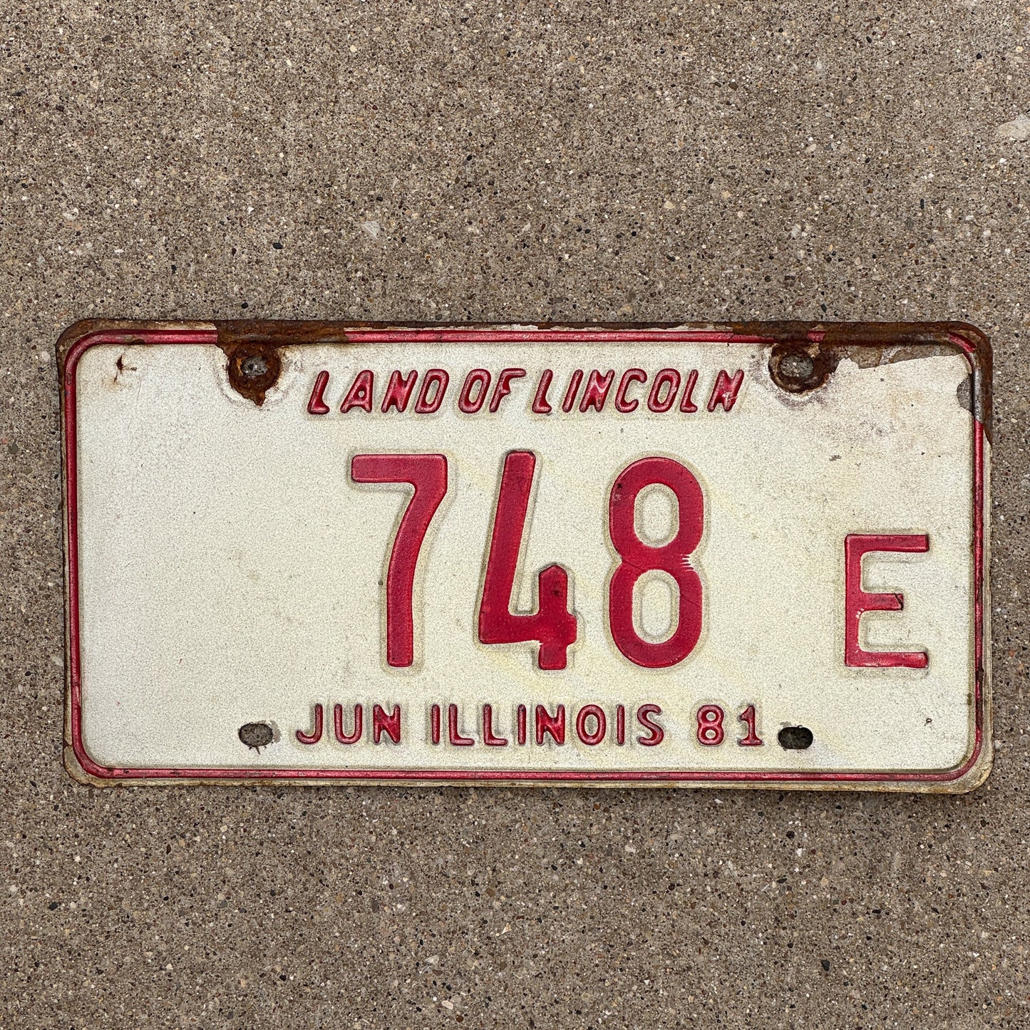Photo of a 1981 Illinois TRUCK License Plate Auto Tag Garage Decor Vintage Three Digit 748 E