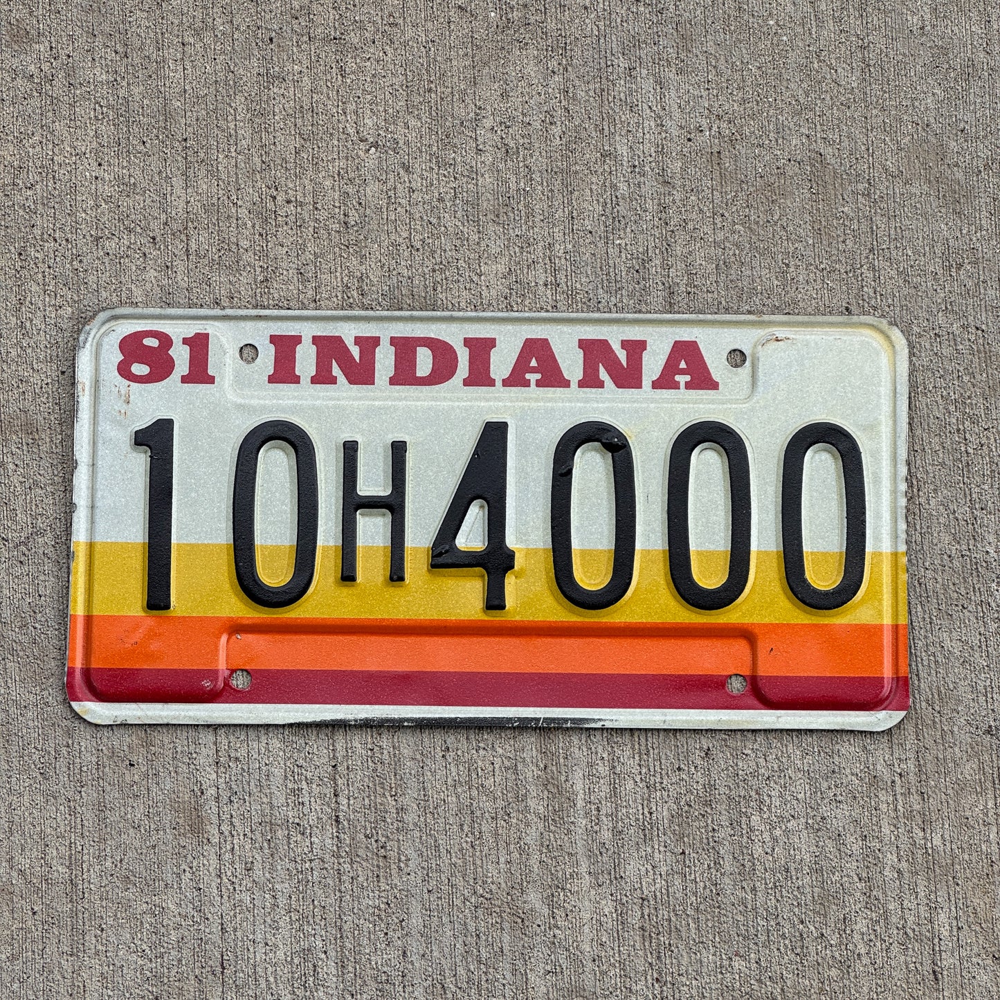 Photo of a 1981 Indiana License Plate Auto Tag Garage Decor Vintage 10 H 4000 with original patina