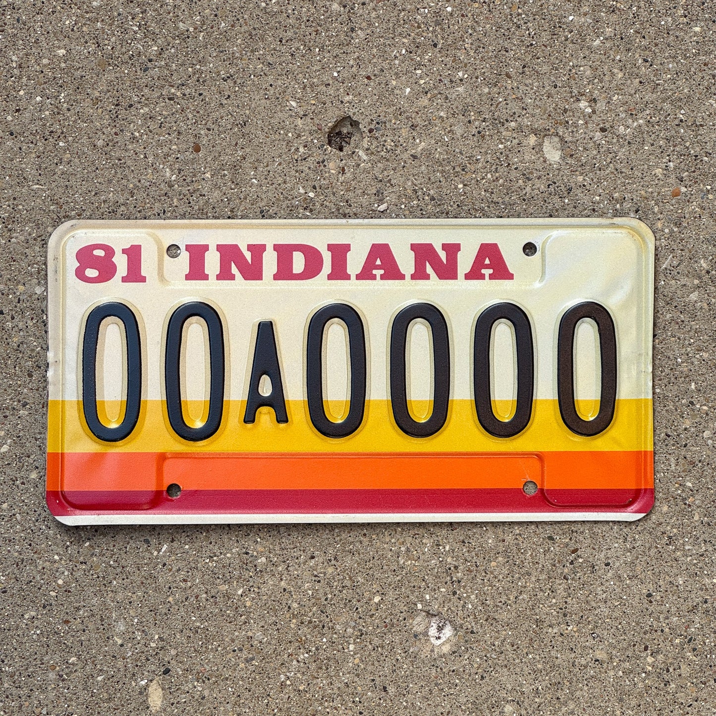 Photo of a 1981 Indiana Sample License Plate Auto Tag 2 Garage Decor 00A0000 with original patina