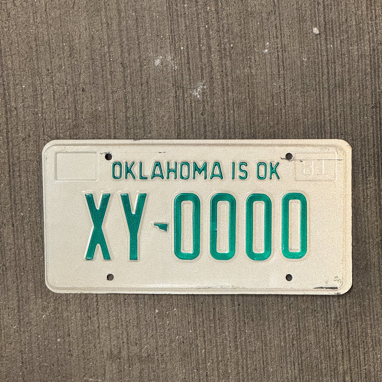 Photo of a 1981 Oklahoma SAMPLE License Plate Auto Tag Garage Decor Vintage XY 0000