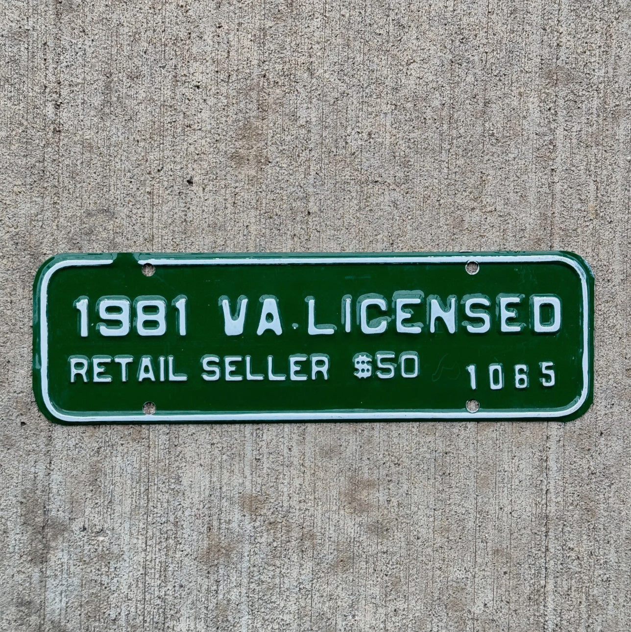 Photo of a 1981 Virginia Retail Seller License Plate Auto Tag Garage Decor Vintage Oddball 1065