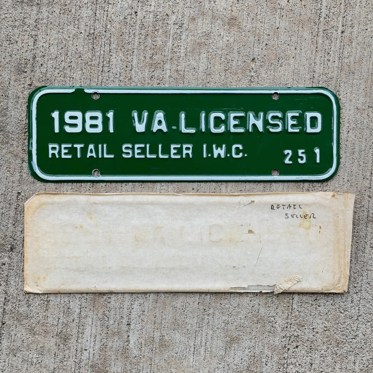 Photo of a 1981 Virginia Retail Seller License Plate Auto Tag Garage Decor Vintage Oddball IWC 251