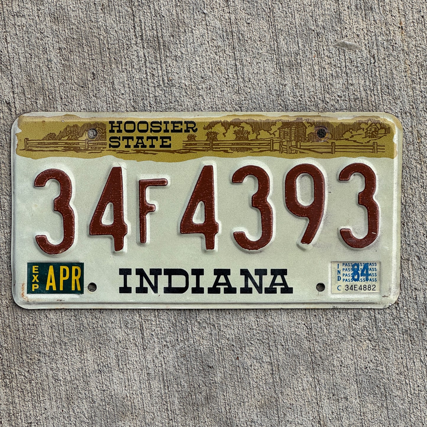 Photo of a 1982 1984 Indiana License Plate Auto Tag Garage Decor Vintage 34 F 4393 with original patina